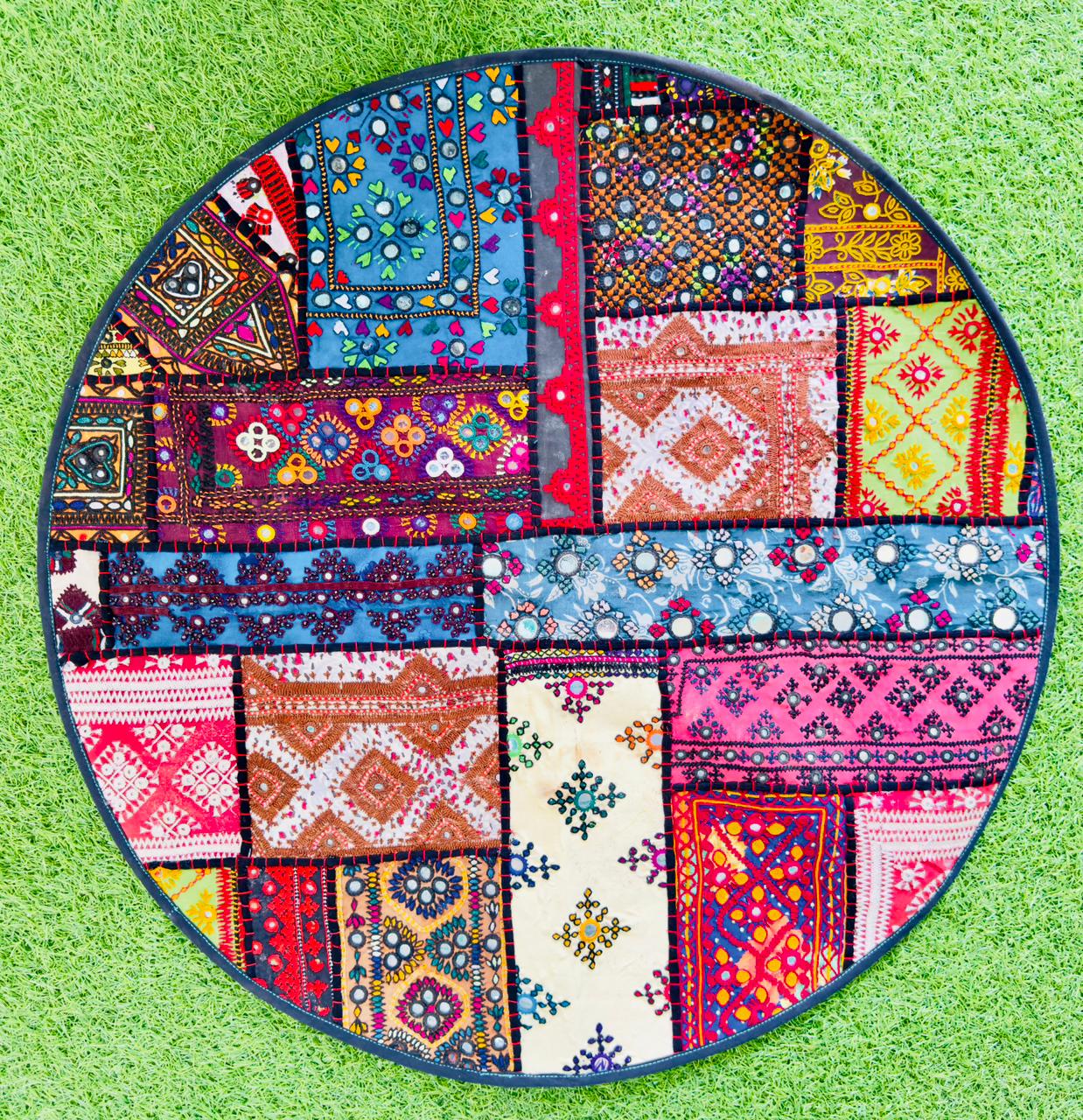 Circular Sindhi patchwork mirror-work wall panel in multicolour
