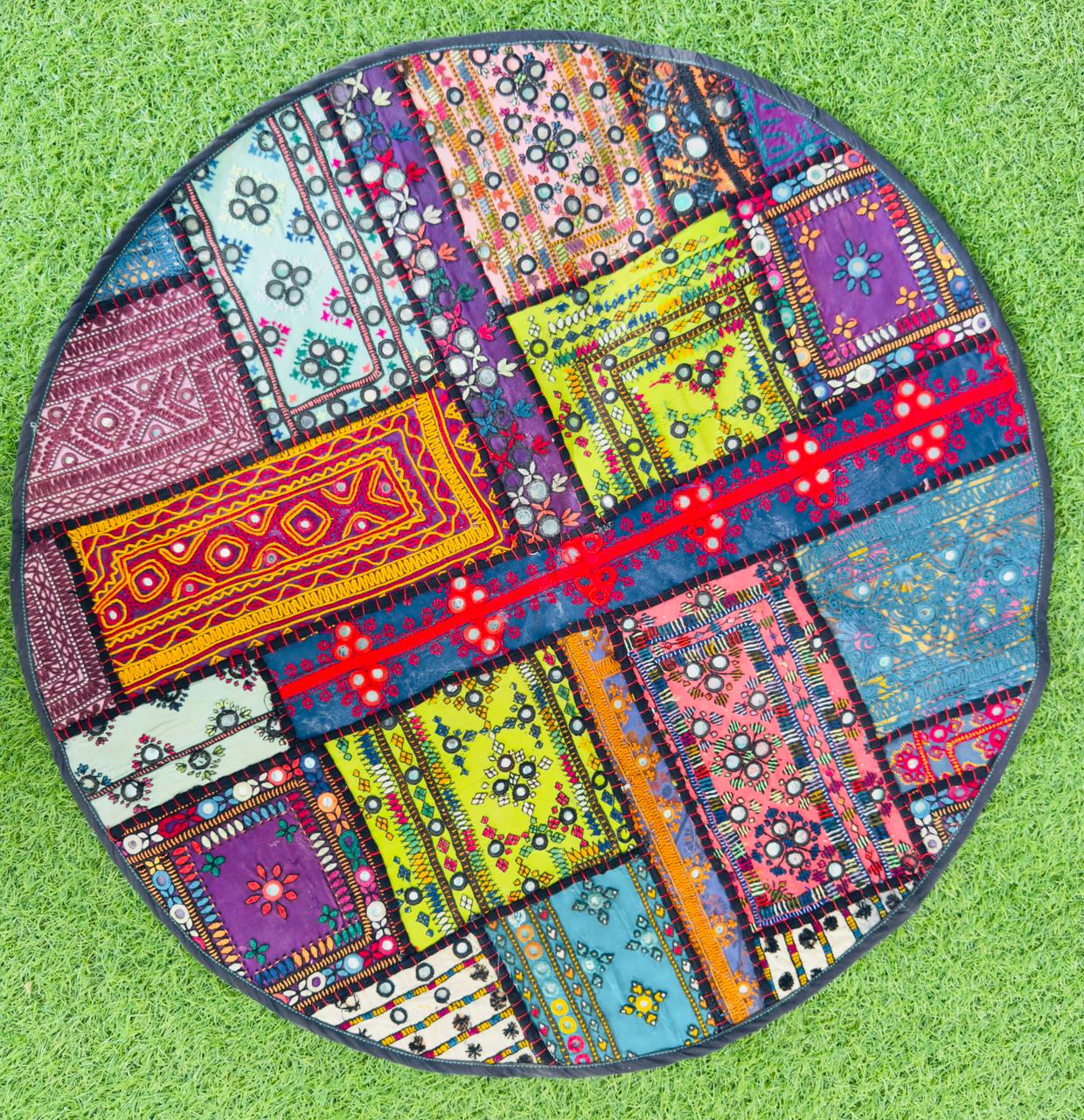 Circular Sindhi patchwork mirror-work wall panel in teal and gold