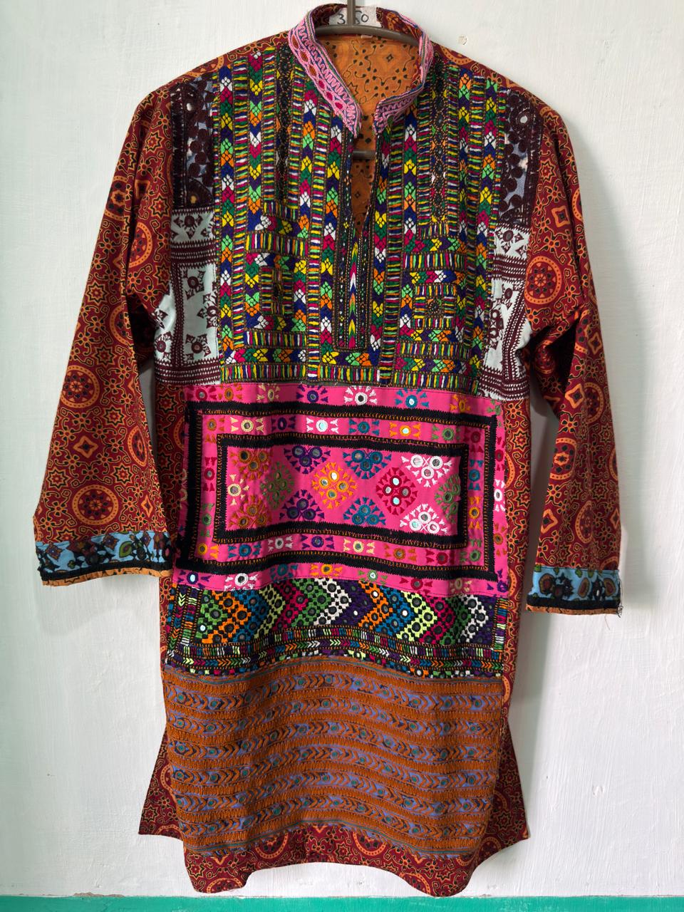 Sindhi embroidered kurta in earth tones with a multicolour yoke, representing custom collections