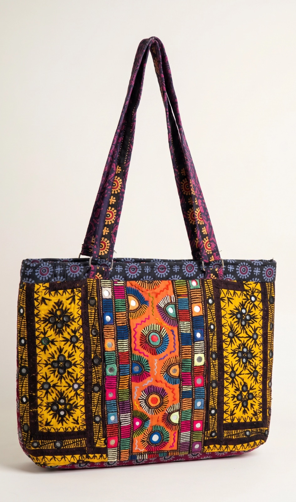Mustard and black embroidered tote shoulder bag with a central mirror-work panel, handmade in Tharparkar, Sindh