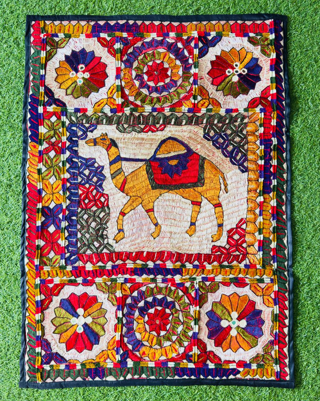 Wall hanging with a camel motif
