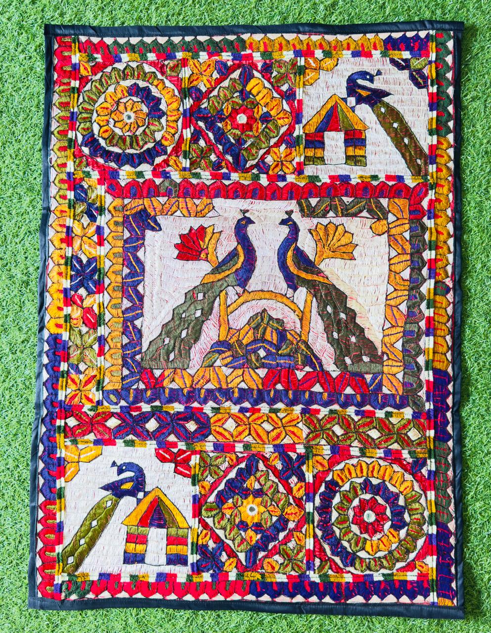Wall hanging with a peacock pair motif